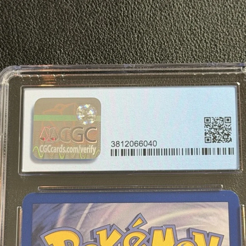 Pokemon Dark Machamp Non-Holo 1st Ed. 27/82 CGC 8.5 TCG Team Rocket 2000 WotC